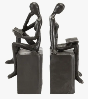 MAN AND WOMAN READING ON A BLOCK CAST IRON BOOKEND SET