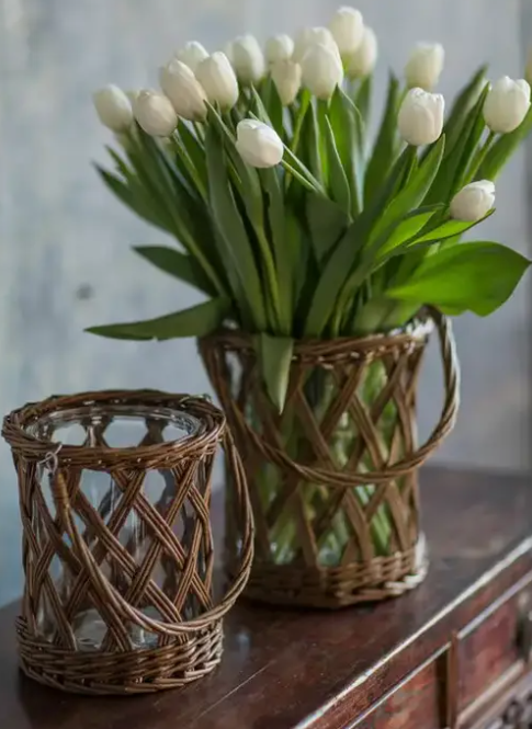 CLASSIC GLASS AND WICKER VASE