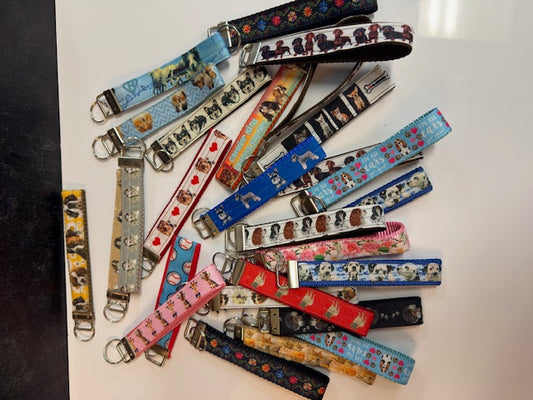 A CHILD'S WONDERLAND BY SONJA McCORD- ASSORTED PET COLLARS AND KEY CHAINS