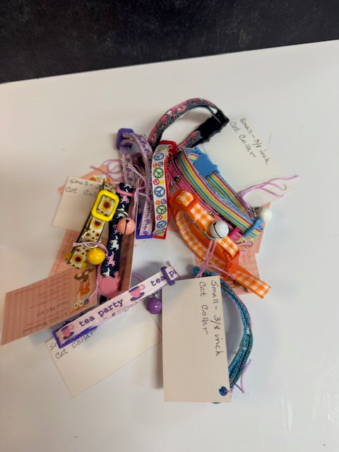 A CHILD'S WONDERLAND BY SONJA McCORD- ASSORTED PET COLLARS AND KEY CHAINS