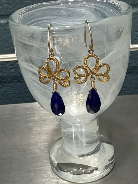 NANCY SCOFIELD JEWELRY - 14KT GOLD-FILL HANDMADE EAR WIRES WITH A TEXTURED BOW FINDING AND A NATURAL BLUE LAPIS CUT GEM EARRINGS