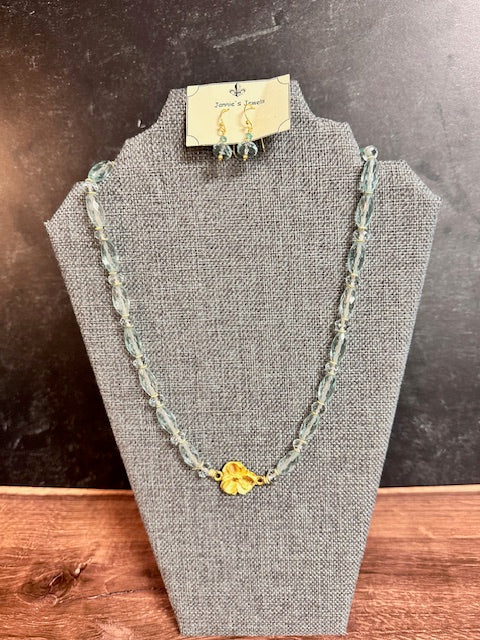 JANNIES JEWELS - NECKLACE 83 AQUA QUARTZ W/ GOLD DOGWOOD CHARM