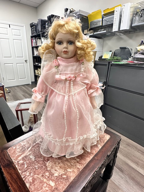 PORCELIAN DOLL WITH BLONDE CURLS IN PINK DRESS WITH ROSES