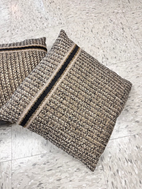 TEXTURED BLACK, CREAM AND GOLD PILLOWS WITH ACCENT RIBBON DETAIL